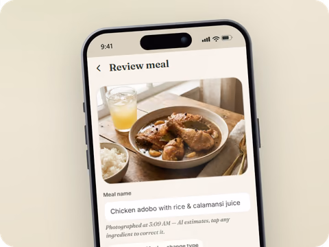 Tavita meal review screen: a photographed plate of chicken adobo identified with calories, macros, and serving controls
