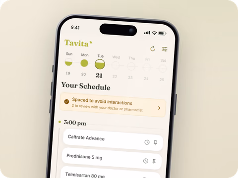 Tavita daily schedule screen with doses grouped by time and a notice that they are spaced to avoid interactions